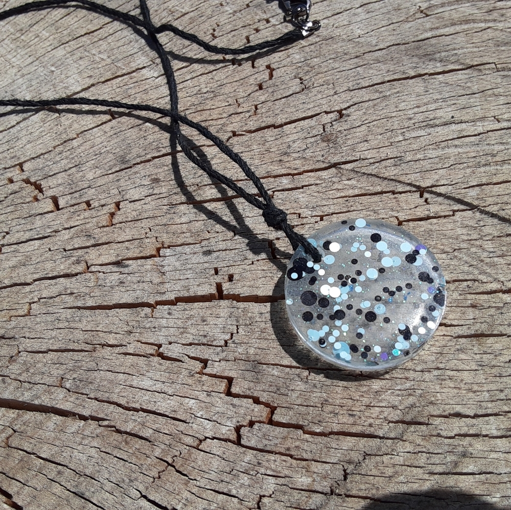 Clear blue and black dot necklace resin
